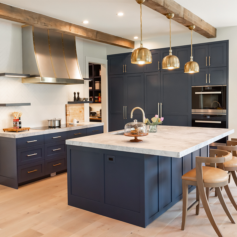 Transitional modern farmhouse kitchen cabinetry cabinets with floating shelves and kitchen island by Woodland furniture in Idaho Falls